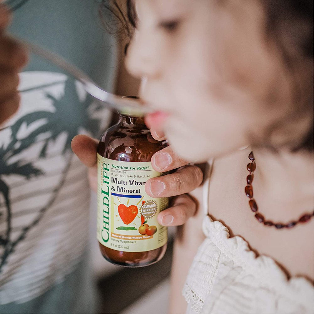 childlife-essentials-multi-vitamin-and-mineral-liquid-supplement-orange-mango-8-fl-oz-05-de5b1c9a933de638cb5a1796a0053697.jpg